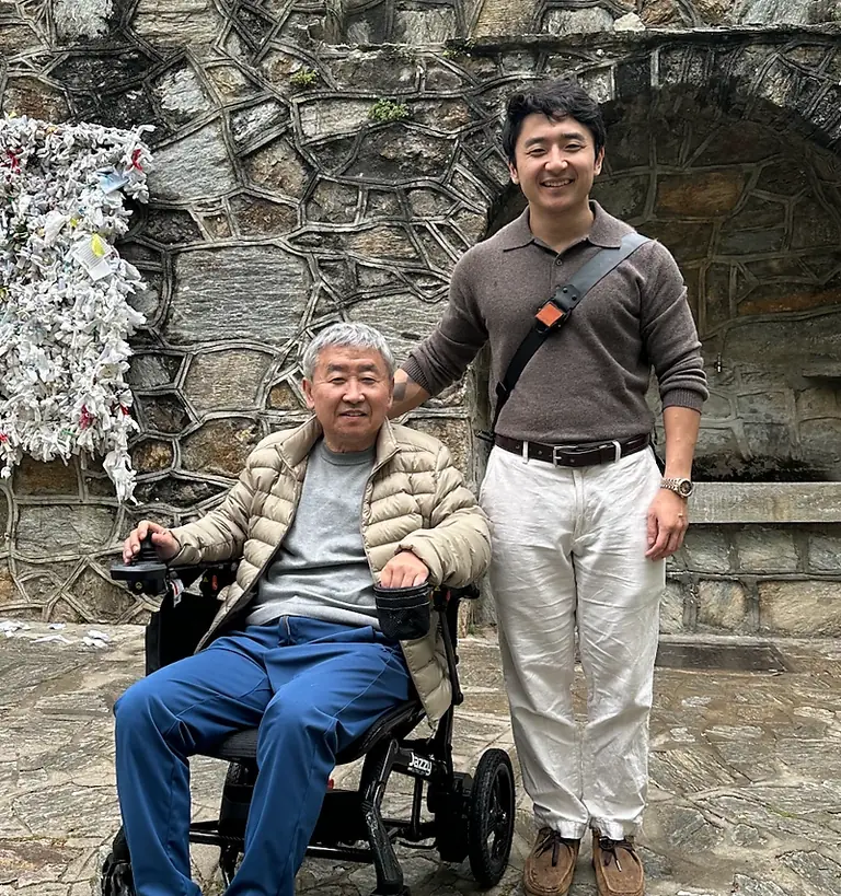 Brian Kim with his father